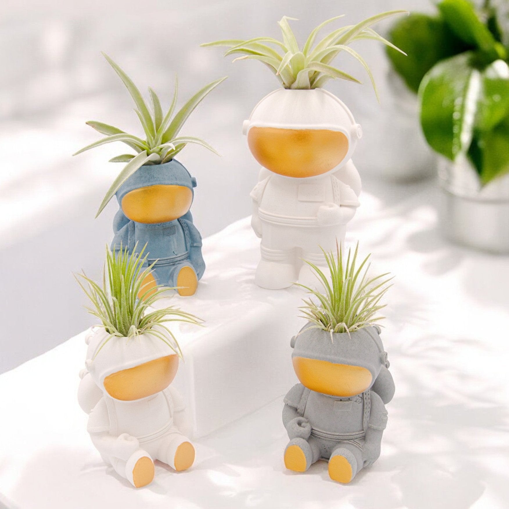 Handmade astronaut airplant pots